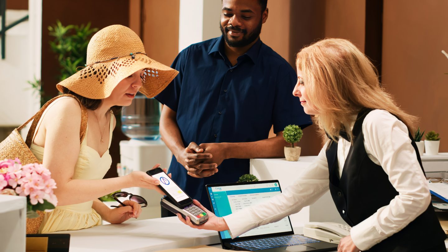 Diverse couple using mobile nfc payment