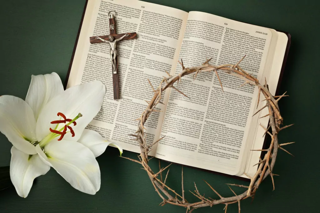 Holy Bible, Crown of Thorns, and White Lily as Easter symbols